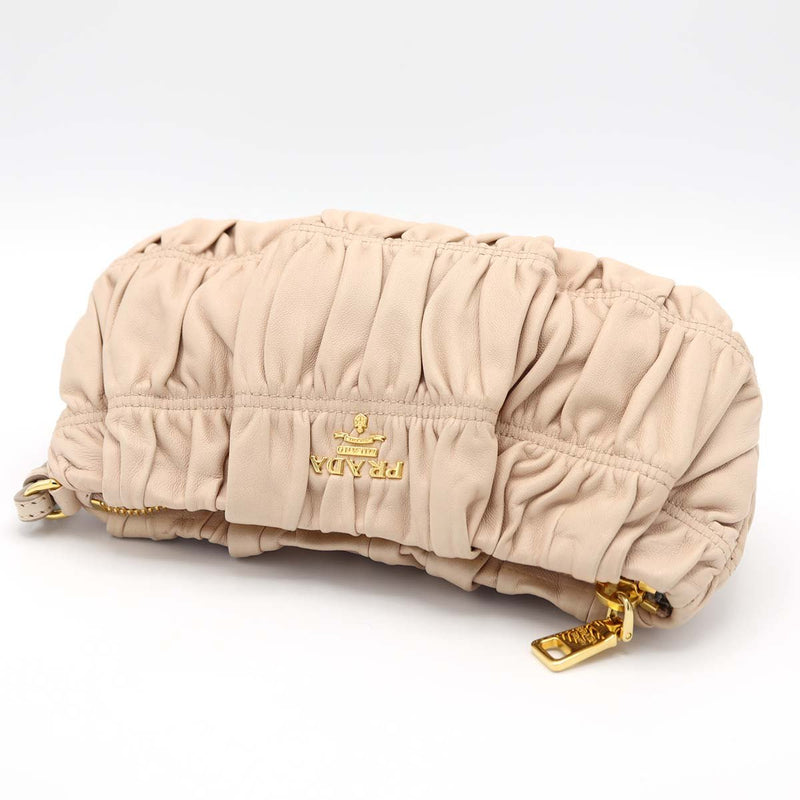 PRADA プラダ ポーチ 1N1584 クラッチバッグ ミニバッグ 化粧ポーチ ラムスキン ピンクベージュ系 22s630-1