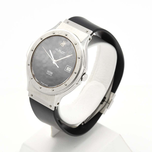 稼働 腕時計 HUBLOT ウブロ MDM 1520.100.1 クォーツ 黒文字盤 ラウンドフェイス デイト 2025.7電池交換済 M851