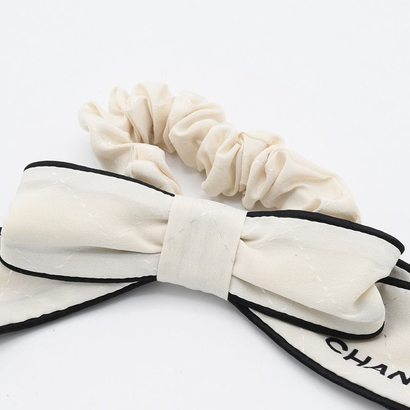 未使用 CHANEL シャネル シュシュ ロゴ リボン シルク100 ヘアアクセ