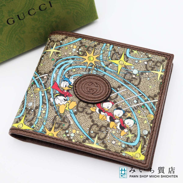 美品 GUCCI グッチ 二つ折り財布 ディズニー ドナルド GGスプリーム ウォレット ブラウン系 箱有 25k355-1