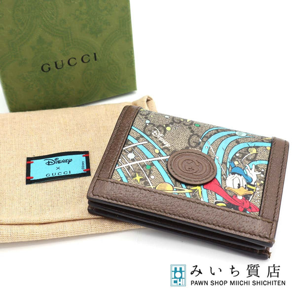 GUCCI グッチ 二つ折り 財布 ディズニーコラボ GGスプリーム ドナルドダック 648121 箱 袋あり 25k675-3